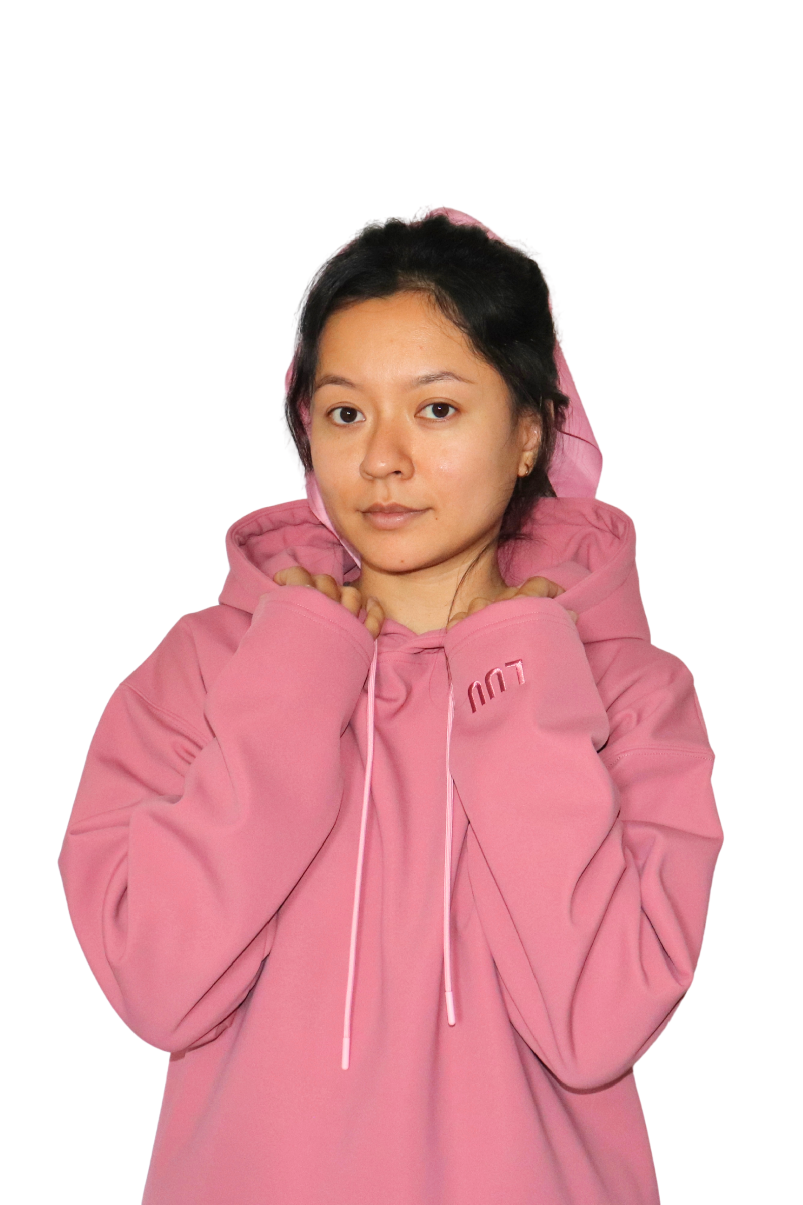 Woman wearing LUU pet hair resistant hoodie in pink